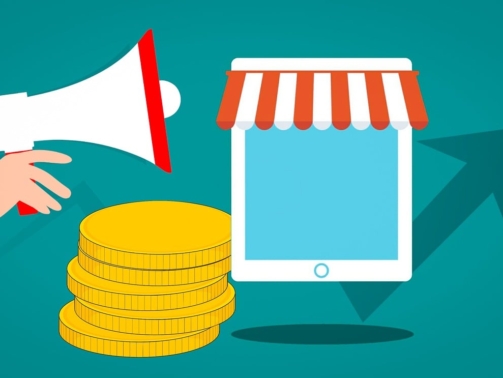 obraz przedstawiający megafon, monety i tablet